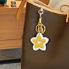Marque de Luxe Sac Fleur Pendentif Mode Élégant Métal Cuir Créatif Exquis Polyvalent Mignon Accessoires Sac Porte-clés