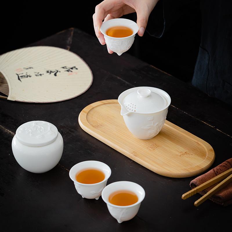 Dehua White Porcelain Mutton Fat Jade Plain Firing Relief Outdoor Travel Tea Set One Pot Three Cups of Fast Guest Cup Business Gifts