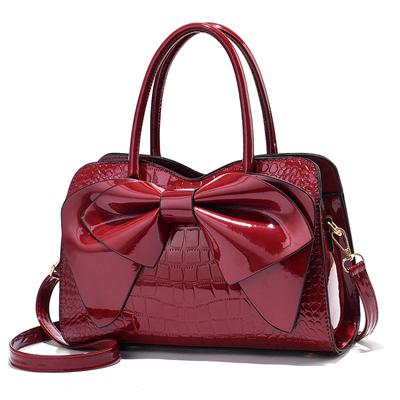 Bolsa feminina Butterfly Festival 2023 Nova bolsa de couro brilhante com grande capacidade e moda de meia-idade de um ombro cruzado