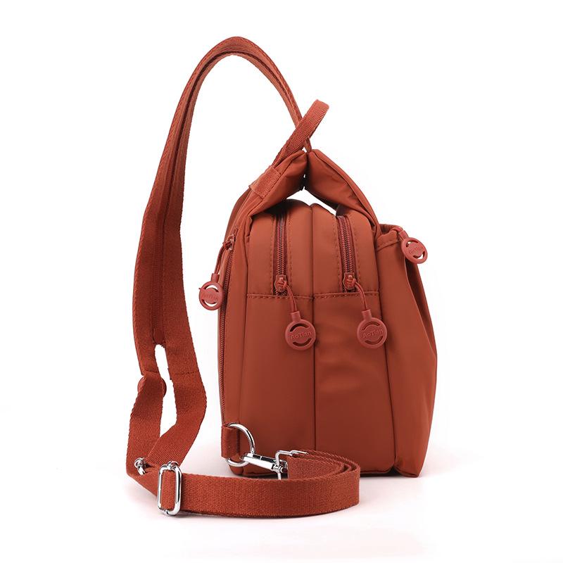 Women's Luxury Oxford Cloth Crossbody Backpack: Large Capacity, Trendy Design.