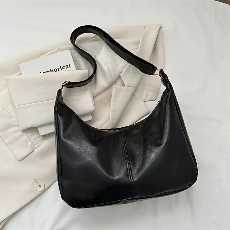 

Coffee Brown Crossbody Bag, Large Capacity for Laptop & Essentials. Versatile for Work & Travel. Durable, Elegant. Shop Now!