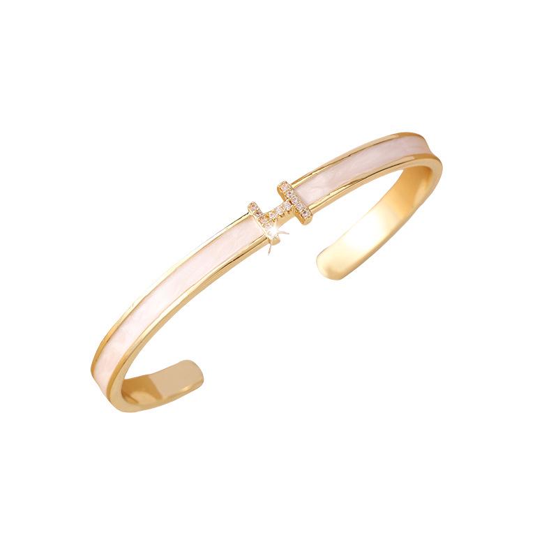 Zirkon Brieföffner Armreif: Luxus Pendelarmband, Exquisiter Modeschmuck für Frauen, Ausgabe 2025.