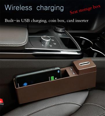 Schwarze Kunststoff Auto Sitzritzen Aufbewahrungsbox mit USB-Anschluss Kabellose Ladeplatte