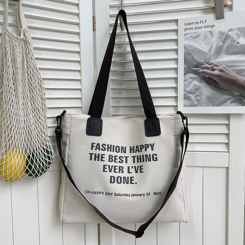 Simple canvas large-capacity bag women's summer new shoulder fashion letter tote bag messenger bag bag