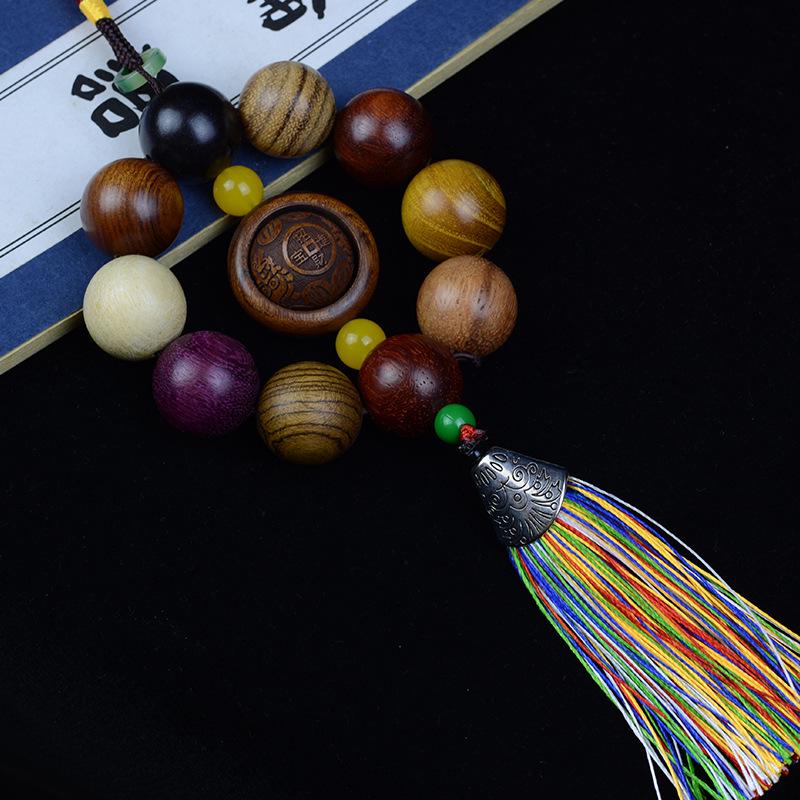 

Green Sandalwood Bead Car Pendant: Creative Wooden Ornament and Handcrafted Bracelet.