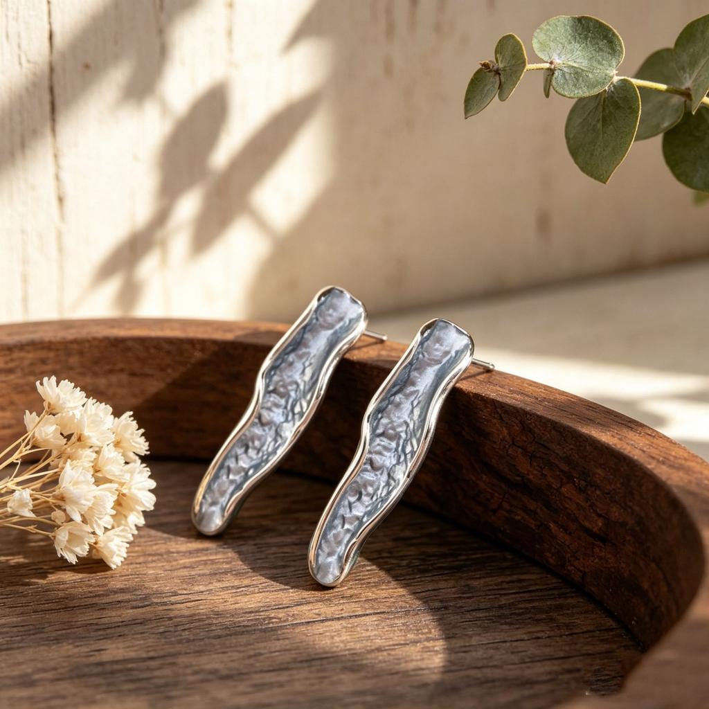 Popular hand-painted enamel stud earrings irregular geometric long strip wave commuting versatile light luxury earrings