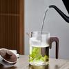 Pokaro Tea Heat-Resistant Glass Teapot, 510ml, with Stainless Steel Lid, Wooden Handle, and Integrated Strainer. Simple Design, Stylish Glass Teapot