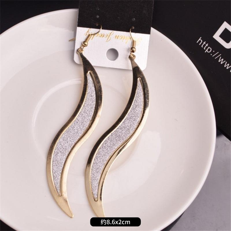Fashion exaggerated niche temperament fringed earrings retro personality versatile sequined earrings women's long ear jewelry