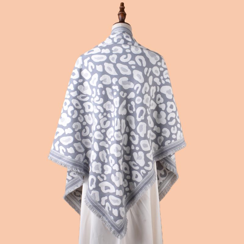 Autumn and winter new classic leopard print tassel imitation cashmere triangle scarf warm scarf shawl fashion spot wholesale