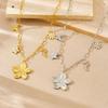 Gold Paperclip Chain Necklace with Flower and Butterfly Charms