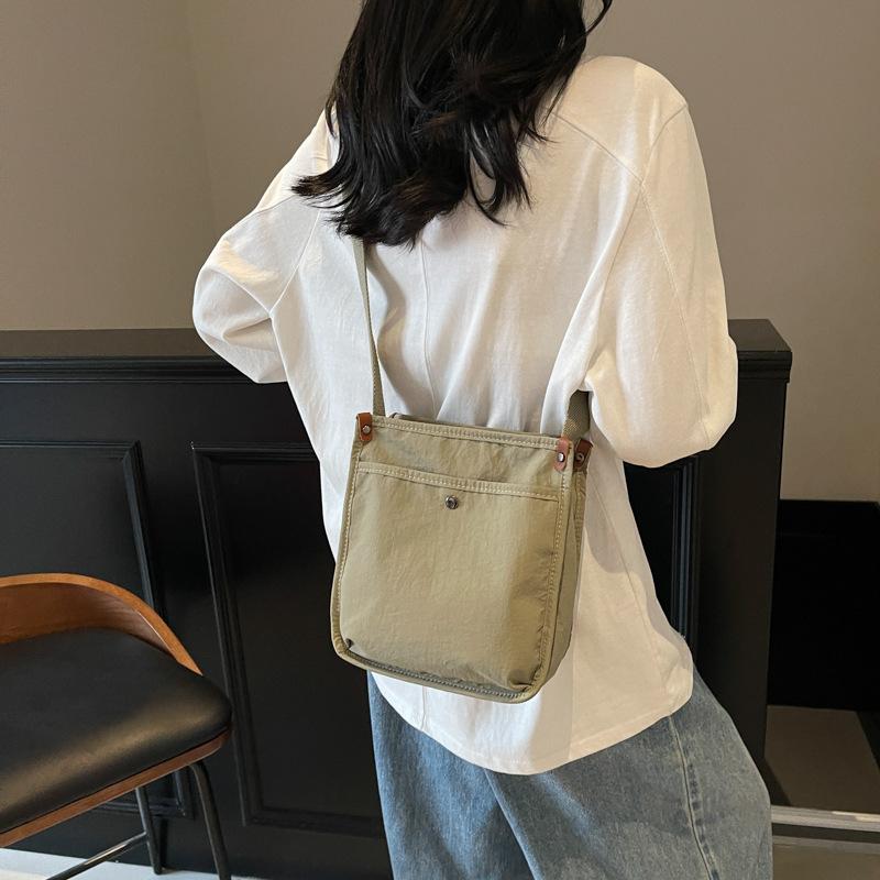 Canvas bag women's large capacity 2025 summer new simple shoulder messenger bag casual fashion trend tote bag