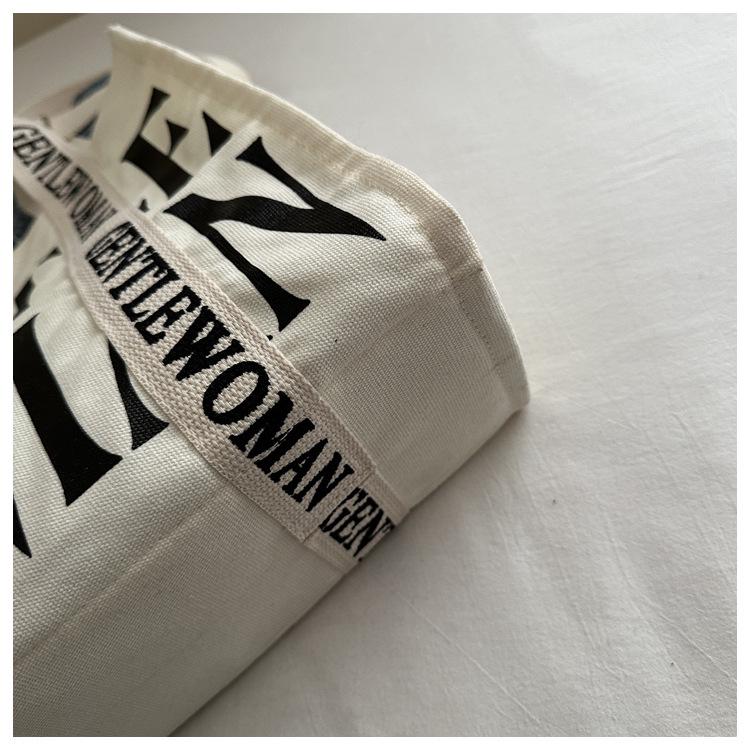 2025 Women's Color-Blocking Canvas Handbag: Trendy Crossbody & Shoulder Bag with Colorful Strap