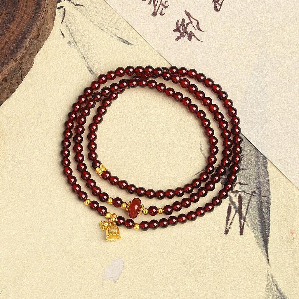 High-End Chinesischer Stil S925 Sterlingsilber Granat Maiglöckchen Blume Perlen Damenarmband