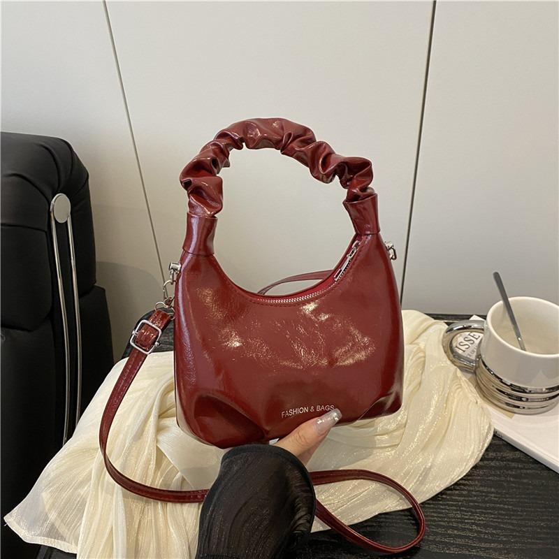 Silver handväska dam ny nischdesign moln messenger bag vår och sommar high-end känsla jobb liten väska