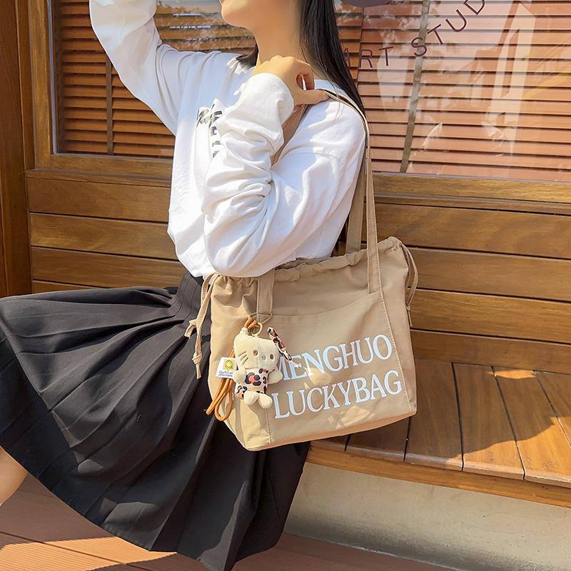 Джинсовая сумка женская сумка через плечо с завязками большая вместительная сумка-тоут — фото 5