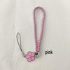 Camellia Four-Leaf Clover PU Leather Phone Wrist Lanyard with Nylon Woven Cord and Phone Case Pendant