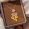 New Chinese bow flower pendant fringed necklace women's gold high-end temperament niche design accessories