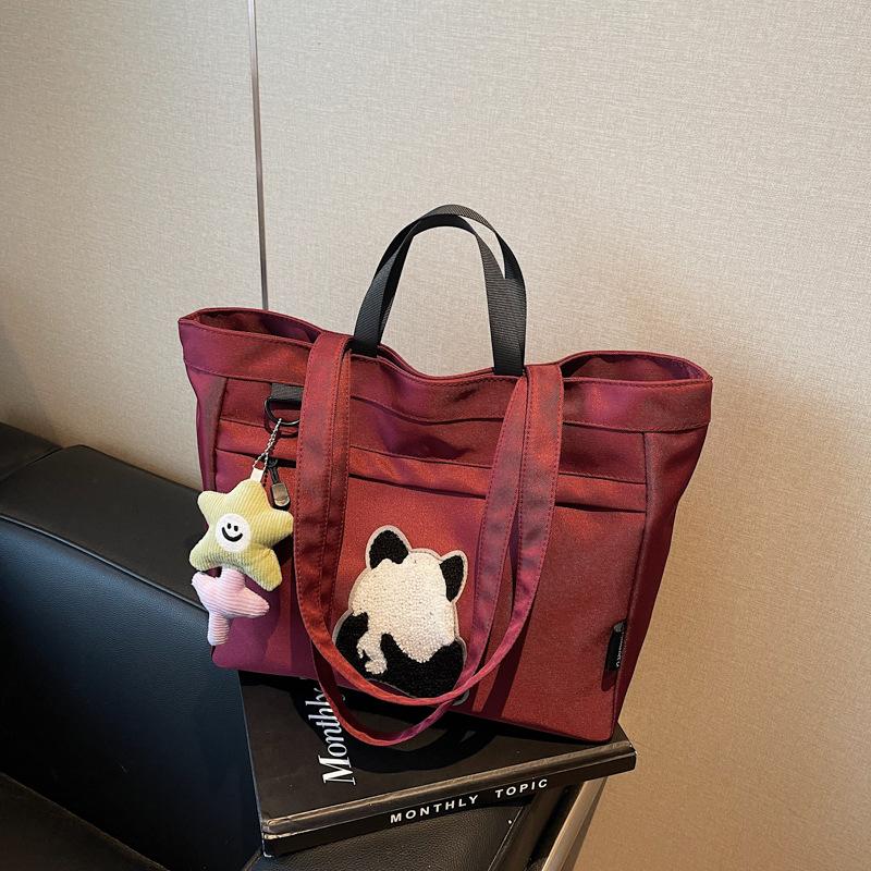 Casual large-capacity shoulder bag women's new fashion handheld cloth bag versatile class tote bag