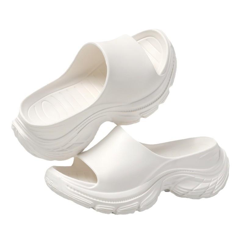 Summer new one-word drag thick-soled high-heeled slippers women's muffin bottom heightening beach shoes wedge heel lazy sandals