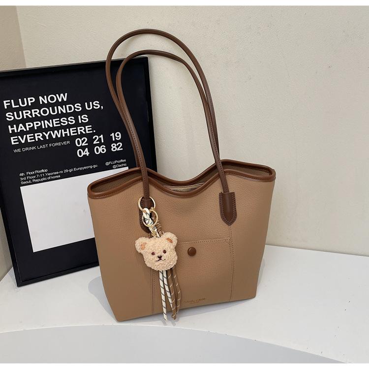 

Premium commuter large-capacity bag women s 2025 new casual college student class bag fashionable portable tote bag хакі