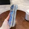 Blaues Kirschblüten-Bohrdesign Handyhülle für Apple 15/16/17Pro/ProMax - Stoßfeste Epoxidharz-Oberfläche