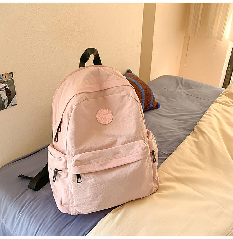 School bag Japanese simple solid color backpack light commuting large capacity student school bag casual versatile outdoor travel backpack