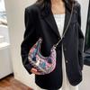 Trendy Crescent Satchel With Tassels And Chain For Streetwear Fashion