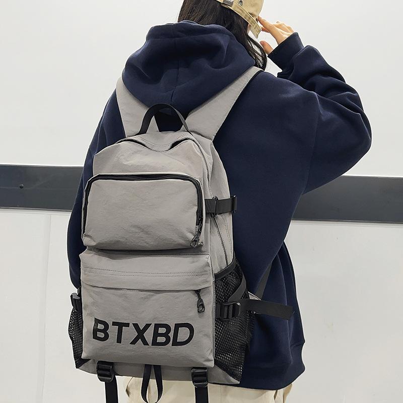 Outdoor sports and leisure large-capacity backpack, men's and women's commuter mountaineering bag, high school college student computer class bag