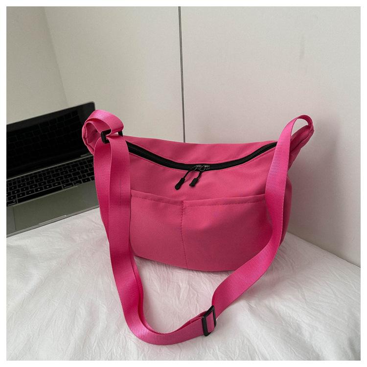 Spring new fashionable versatile solid color messenger bag casual simple dumpling bag street trend large capacity schoolbag
