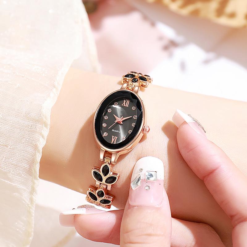 Luxury Rhinestone Women's Wristwatch with Round Dial and Colored Diamond Bracelet.