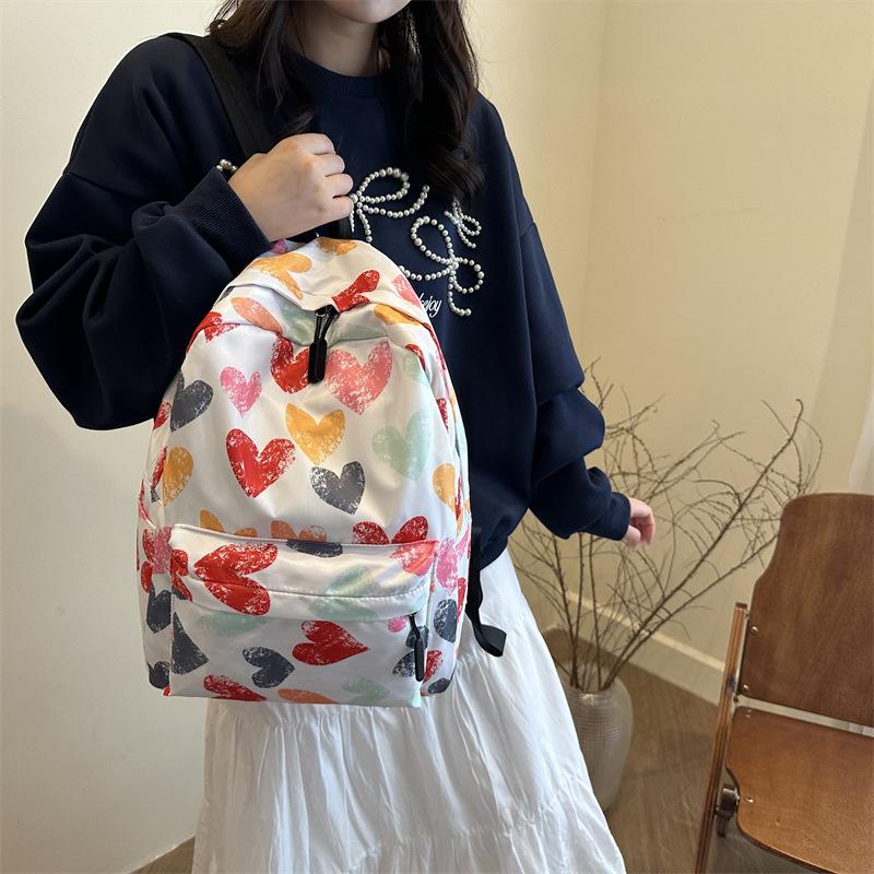 School bag female Mori junior high school girl backpack high school college student graffiti color matching lightweight backpack