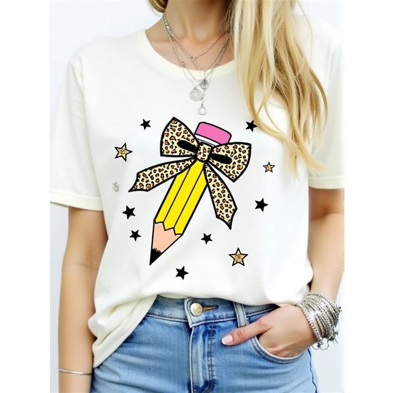

Womens Lime Green Spanish Alphabet T-Shirt | Short Sleeve Round Neck Casual Top with Spanish Letter Print & Pencil Bow Accent | Teacher Giftring S