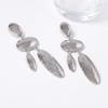 European and American exaggerated atmosphere light luxury cold wind geometric oval pendant earrings retro alloy versatile earrings