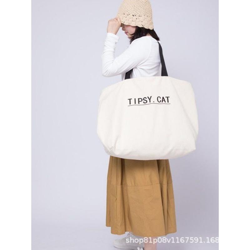 

Large capacity canvas bag, solid color shoulder bag, short trip storage bag, maternity bag, lightweight and environmentally friendly shopping bag. Small size [50*37*20] bottom length [38] белый