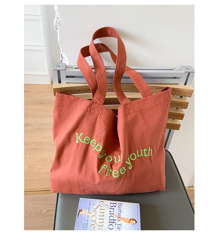 

Summer large canvas bag, cute milk yellow letter embroidered tote bag, women s new large-capacity tote bag кирпич красный
