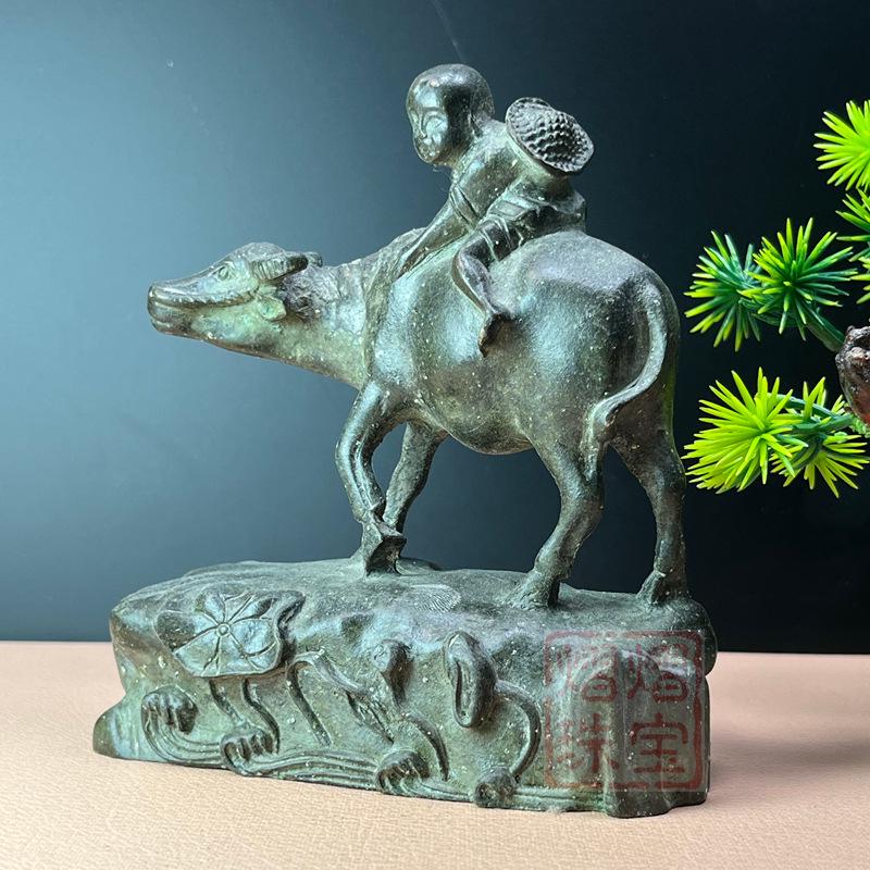

Antique Bronze Child Herding Cattle Tea Pet Ornament