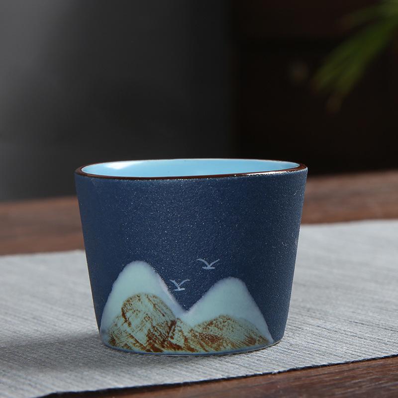 Hand-Painted Black Pottery Zen Tea Cup - Retro Mountain Design, Kung Fu Ceramic Masterpiece for Tea Tasting and Guest Reception.