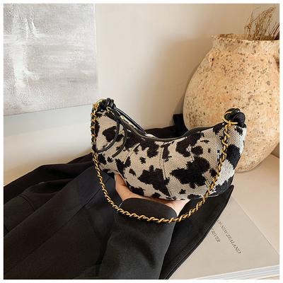 Tasche mit Kuhmuster Damen große Kapazität neue Herbst- und Winternische lässig Ein-Schulter Umhängetasche Pendler Knödeltasche