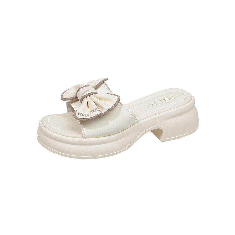 

Thick-bottomed slippers women summer wear Internet celebrities thick-bottomed bows one-word slips heightening fashion super fire fairy wind sandals 40
