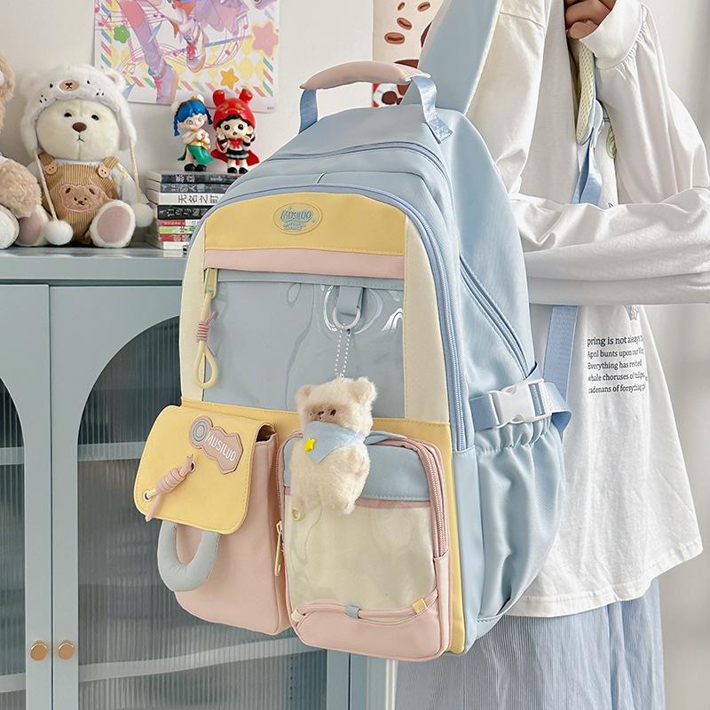 Junior high school student schoolbag college wind large capacity female contrasting color design small fresh backpack cute girl backpack pain bag