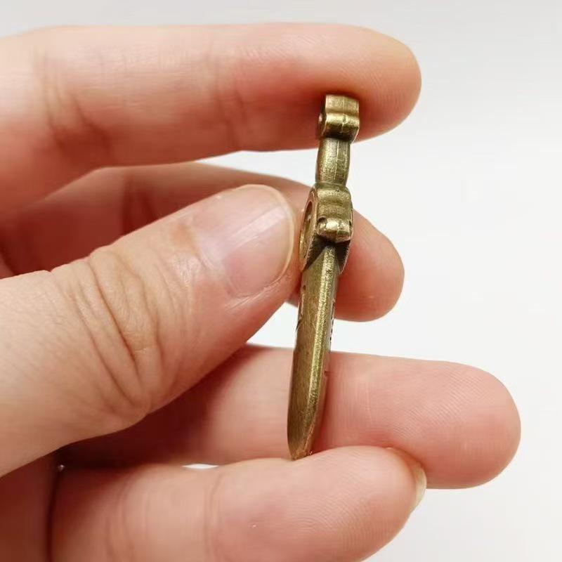 Golden Bagua Seven-Star Sword Pendant Keychain: Stylish Amulet for Luck and Prosperity, Unisex Accessory for Peaceful Protection.