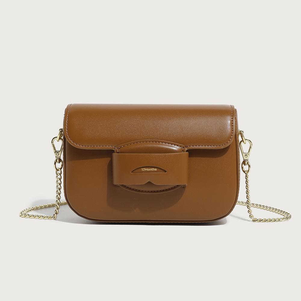 Niche design bag spring women's versatile fashion high-end exquisite messenger bag saddle tofu small square bag