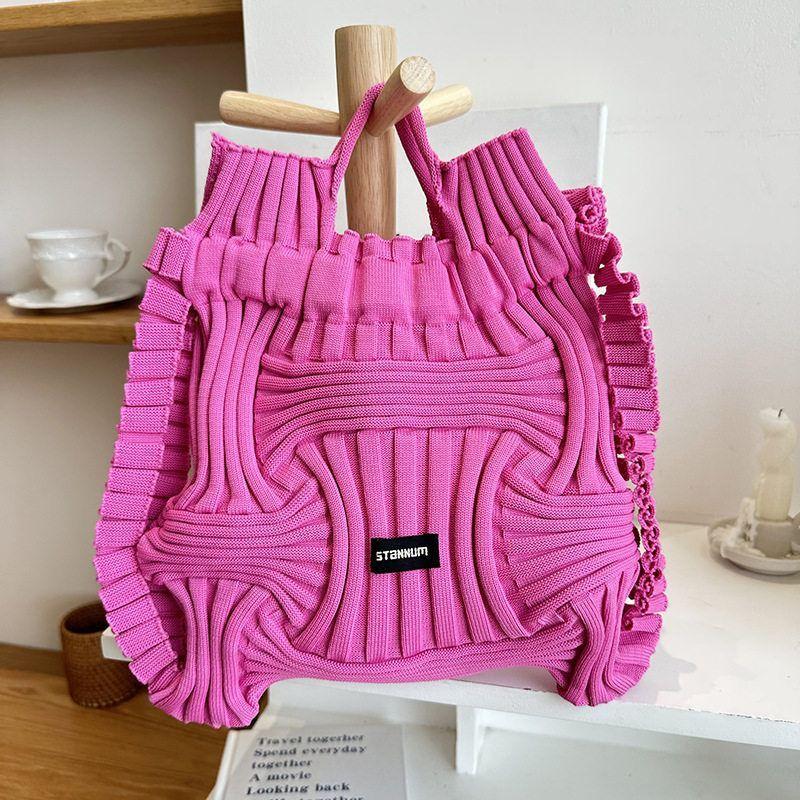 

Backpack Women South korea Dongdaemun Personalized Niche Design Casual Knitted Woven Handbag Drawstring Hand Bag New Rose Red