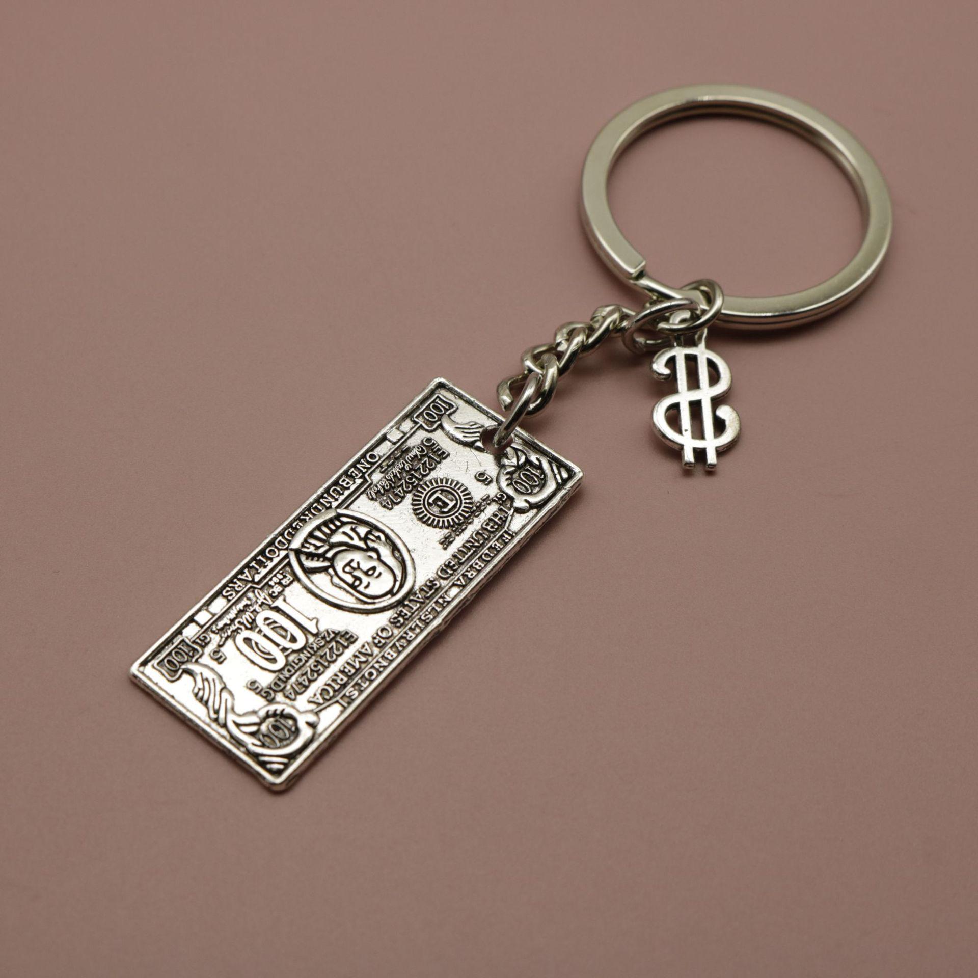 Модный брелок-подвеска - популярный и продаваемый аксессуар серебряный