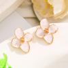 Soft Pink Enamel Flower Stud Earrings with Gold Tone Accents for Women Elegant Style