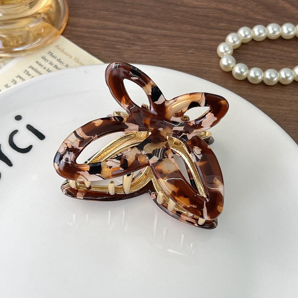 

Элегантная ацетатная шпилька-бабочка — универсальный и модный дизайн в виде акулы