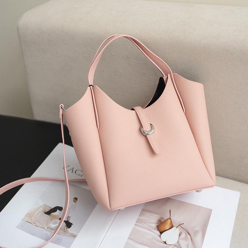 

Spring and Summer Genuine Leather Women s Hand-held Tote Bag Fashionable Wind Chime Bag Crossbody Bag рожевий