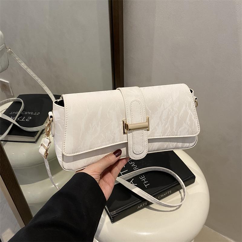 French Niche Design Bag Women's 2025 New Popular Versatile Messenger Bag High-end Single Shoulder Underarm Baguette Bag