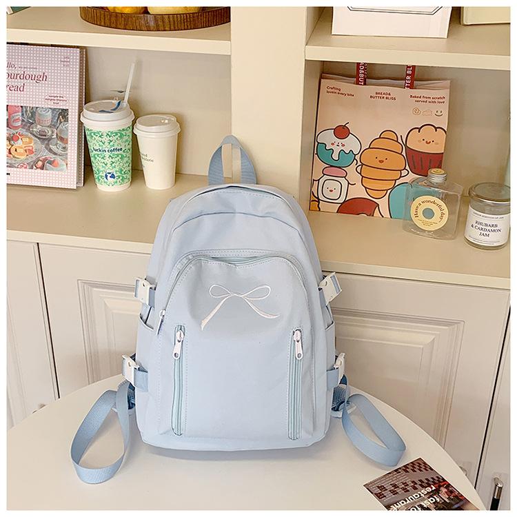 School bag cute Korean version versatile junior high school students casual simple solid color bow back