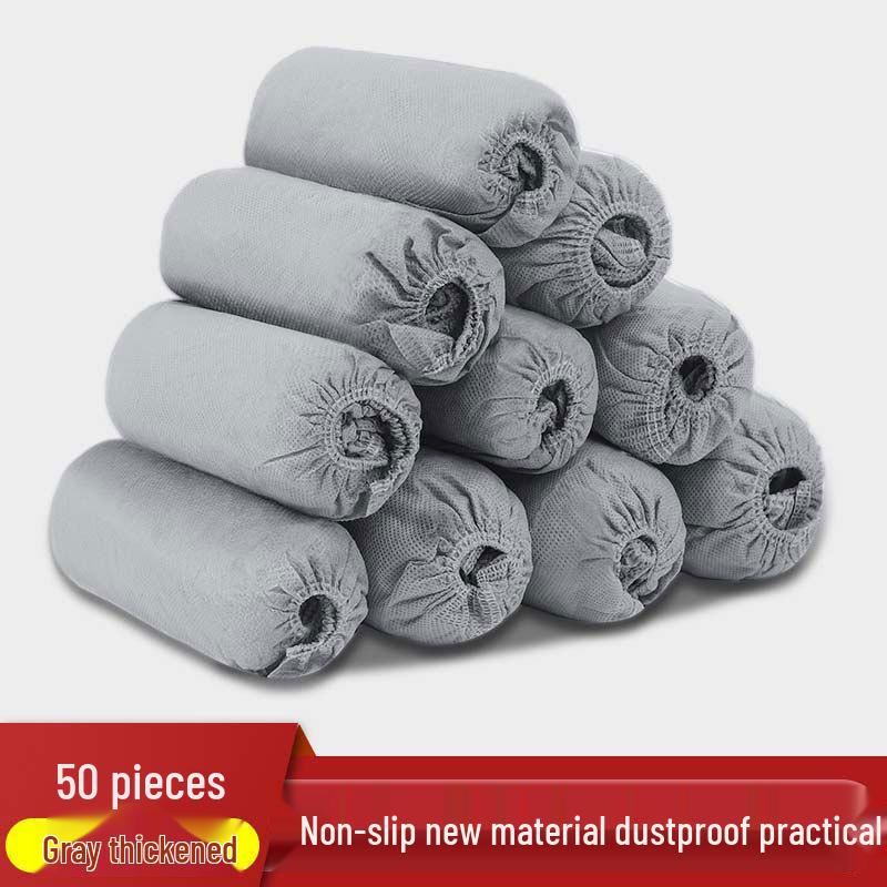 

Серые Нескользящие Одноразовые Бахилы - Утолщенный Нетканый Материал для Использования в Помещении